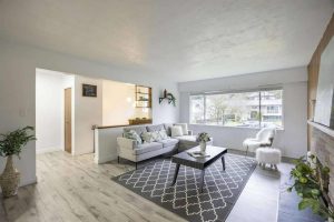 Living Room with Fireplace - 2418 Warrenton Ave Coquitlam - Cozy Main Level