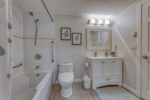 North Vancouver condo for sale Lower Lonsdale full bathroom with tub and vanity