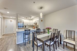 North Vancouver condo for sale Lower Lonsdale dining room and open kitchen
