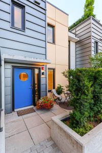 North Vancouver Townhouse for Sale Lynnmour – WINFORD Private Entrance Porch with Blue Door and Flowers