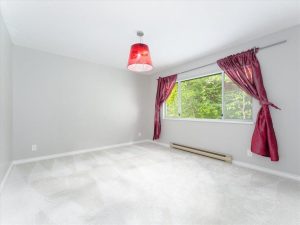 Secondary bedroom of 3965 Braemar Place, Upper Lonsdale North Vancouver home listed by Parham Baghaie, Cheng Parham Realty Group.