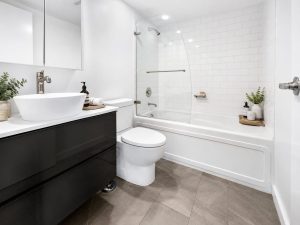 Modern renovated bathroom with tile finishes – 3304 Residences on Georgia 1200 W Georgia Street Vancouver condo
