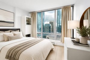 Primary bedroom with panoramic city views – 3304 Residences on Georgia 1200 W Georgia Street Vancouver West End condo