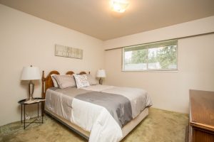 Bedroom with Window - 2418 Warrenton Ave Coquitlam - Bright Natural Light